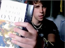 Image of Skyler holding up his copy of the Metamorphoses