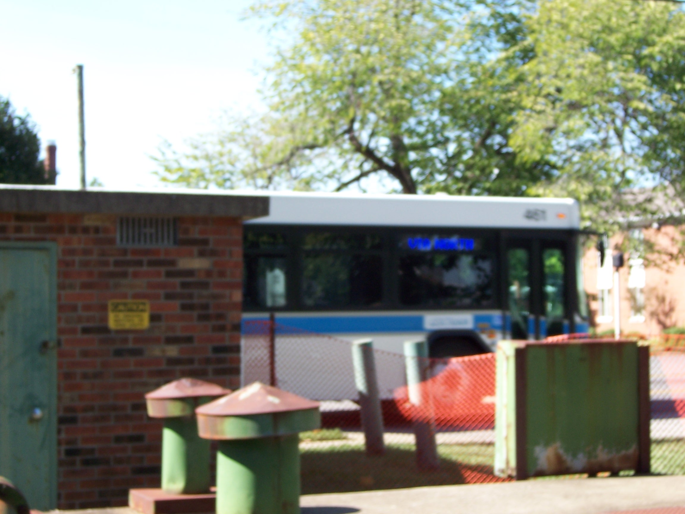 The bus passes by the memorial