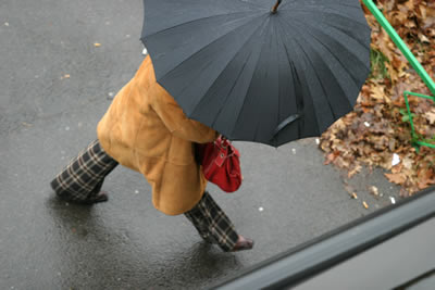 Stay dry and safe getting off the bus on a rainy day